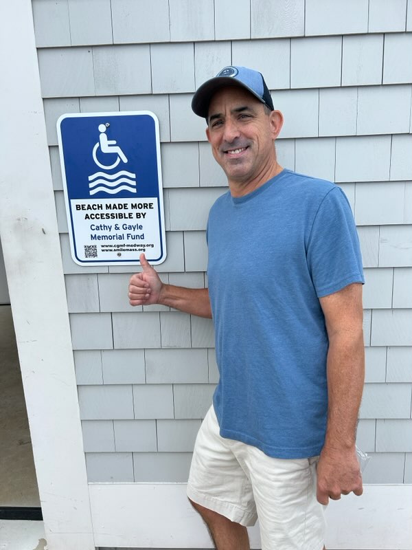 Jeremy with signage